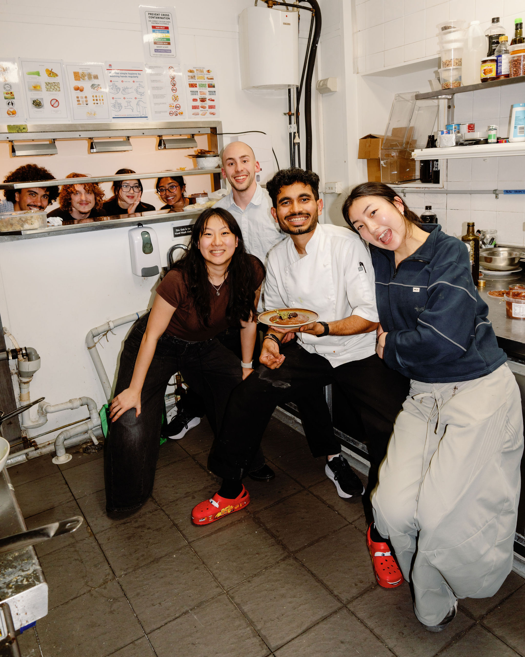 The crew gathered in the kitchen